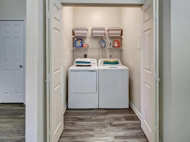 Washer dryer iron shelves laundry room at Campus Edge on UTSA Boulevard in San Antonio Student Accommodation