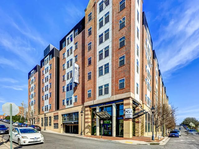 Brick apartment building entrance and street exterior at 8 1/2 Canal Street in Richmond Student Accommodation