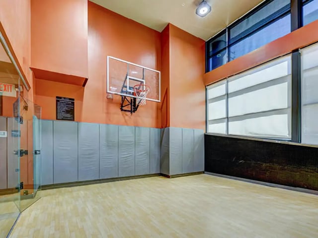 Basketball hoop on padded wall and wooden floor playing area at 8 1/2 Canal Street in Richmond Student Accommodation