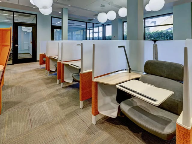 Study carrels with chairs desks and lamps Study area at Currie Hall in Los Angeles Student Accommodation