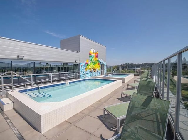 Pool and hot tub with lounge chairs exterior at 959 Franklin in Eugene Student Accommodation