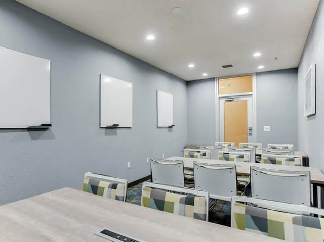 Whiteboards and tables in classroom study area at GrandMarc Seven Corners in Minneapolis Student Accommodation