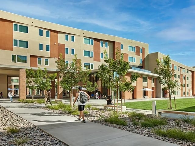 Modern student housing building with courtyard exterior at North District in Riverside Student Accommodation