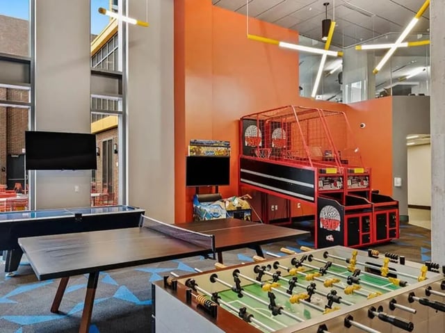 Foosball air hockey ping pong TVs basketball game playing area at The Summit at University City in Philadelphia Student Accommodation