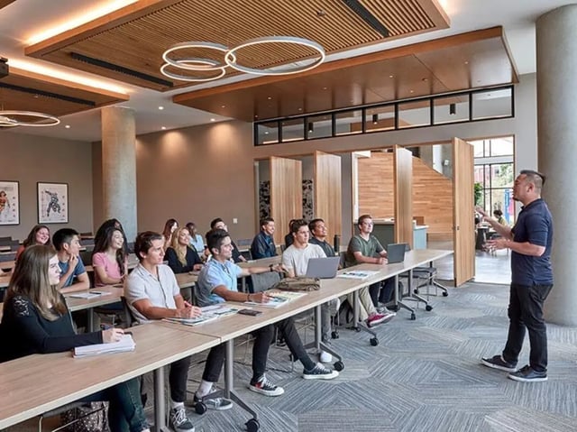 Students in classroom with instructor lecture hall at Plaza Verde in Irvine Student Accommodation