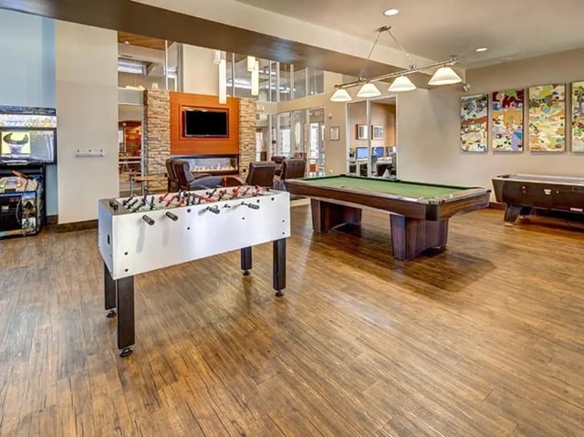 Foosball table pool table gaming area at Hilltop Townhomes in Flagstaff Student Accommodation