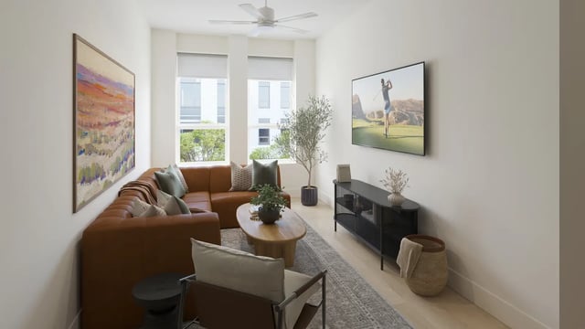 Brown sectional coffee table tv and artwork living room at Morado on Berry in Fort Worth Student Accommodation