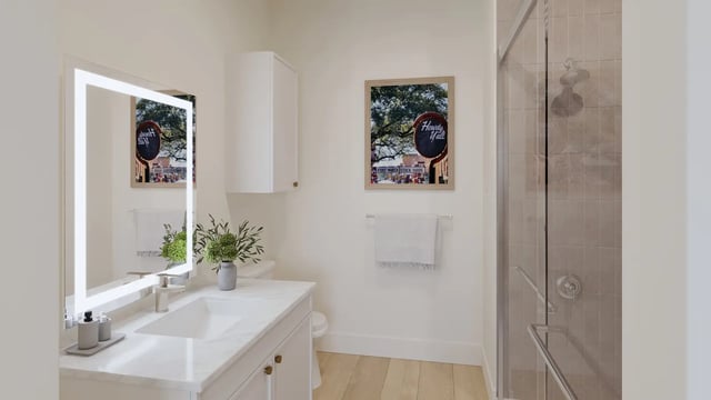 Modern vanity mirror artwork shower bathroom at Morado on Berry in Fort Worth Student Accommodation