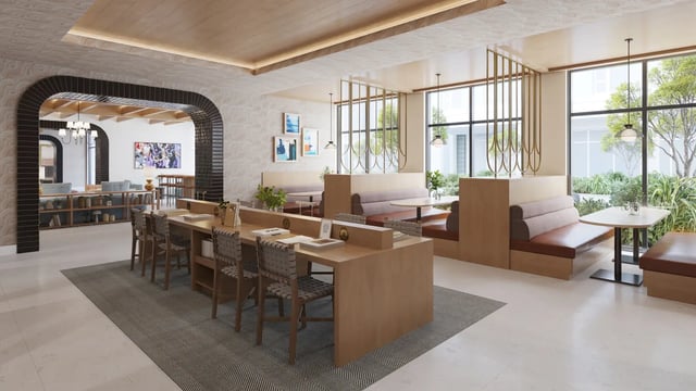 Wooden desks with chairs and booths lounge area at Morado on Berry in Fort Worth Student Accommodation