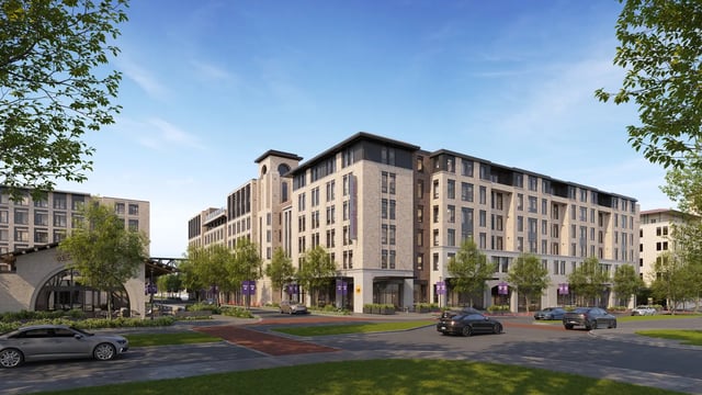 Modern student housing building with cars exterior at Morado on Berry in Fort Worth Student Accommodation