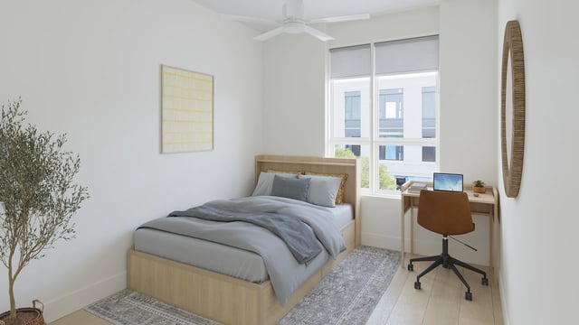 Bed desk plant mirror and framed artwork bedroom at Morado on Berry in Fort Worth Student Accommodation