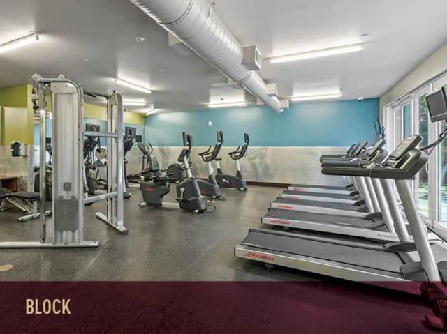 Gym with treadmills and exercise bikes gym at Stadium Centre - The Axis in Tallahassee Student Accommodation
