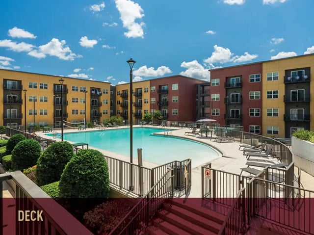 Apartment buildings pool lounge chairs exterior at Stadium Centre - The Axis in Tallahassee Student Accommodation