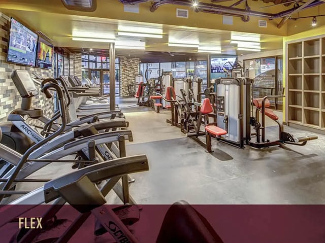 Gym with treadmills and weight machines gymnasium at Stadium Centre - The Axis in Tallahassee Student Accommodation