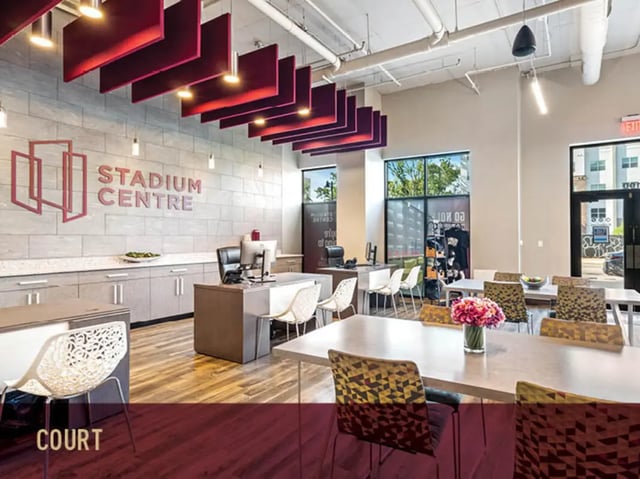 Reception desks computers and seating common area at Stadium Centre - The Edge in Tallahassee Student Accommodation
