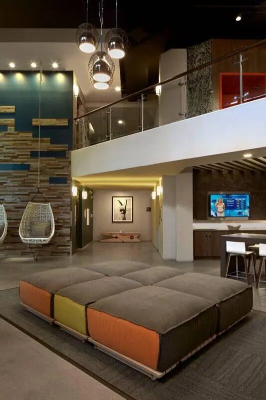 Modular seating with hanging chairs lounge area at 114 Earle in Clemson Student Accommodation