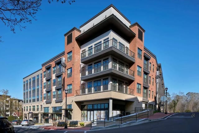 Modern brick building with balconies and windows exterior at 114 Earle in Clemson Student Accommodation