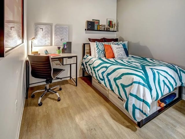 Desk with chair and bed bedroom at The Jack in Flagstaff Student Accommodation