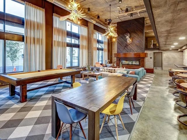 Billiard table seating area with fireplace living room at The Jack in Flagstaff Student Accommodation