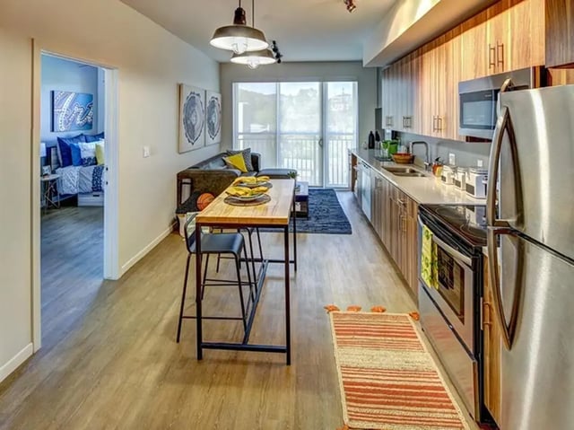Island dining area living room and kitchen exterior at The Jack in Flagstaff Student Accommodation
