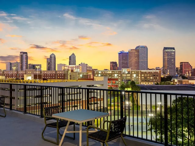 Rooftop balcony with city view and seating exterior at Apella on Newport in Tampa Student Accommodation