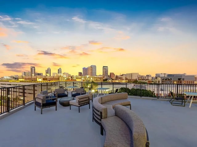 Outdoor seating area with cityscape view exterior at Apella on Newport in Tampa Student Accommodation