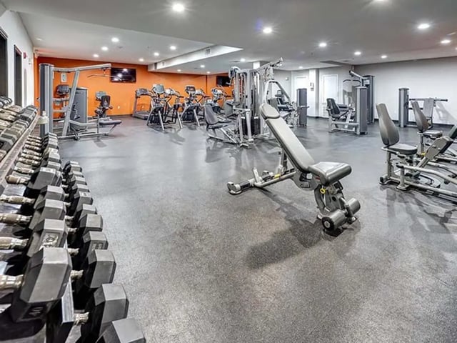 Weight rack dumbbells workout machines fitness room at The Block on 28th in Austin Student Accommodation