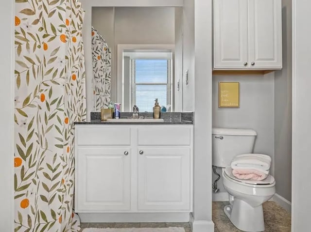 Floral shower curtain sink toilet bathroom at University Crossings in Philadelphia Student Accommodation