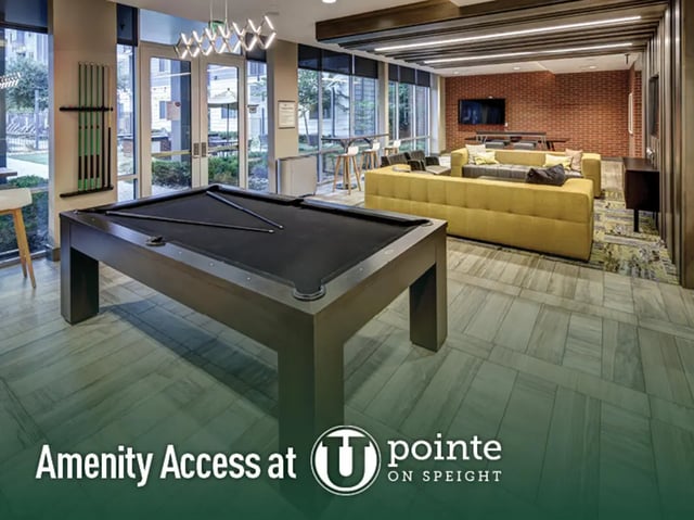 Pool table and seating area recreation room at Union in Waco Student Accommodation
