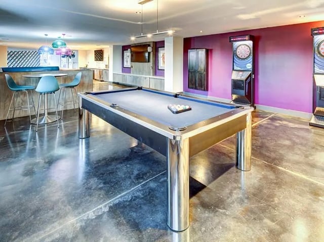 Pool table dart machines bar area living room at University Crossings Charlotte in Charlotte Student Accommodation