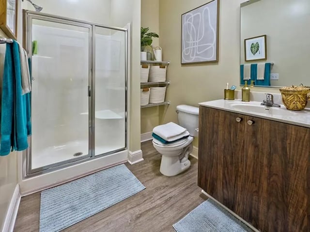 Shower toilet vanity with towels bathroom at University Crossings Charlotte in Charlotte Student Accommodation