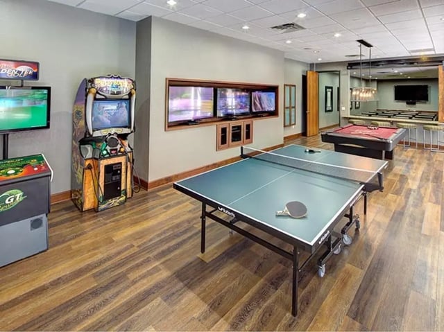 Arcade games ping pong table pool table recreation room at The Callaway House in College Station Student Accommodation