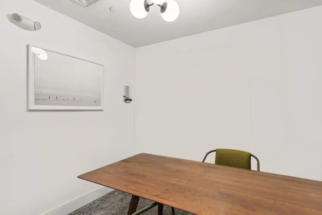 Table with chair and artwork Study area at Paloma University City in Philadelphia Student Accommodation