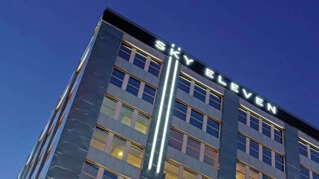 Sky Eleven building windows lit blue sky exterior at Park East in Springfield Student Accommodation
