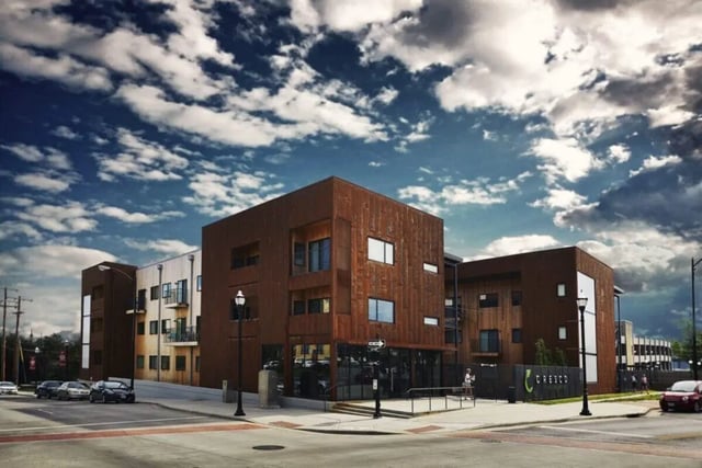 Modern building with apartments and cars exterior at Park East in Springfield Student Accommodation