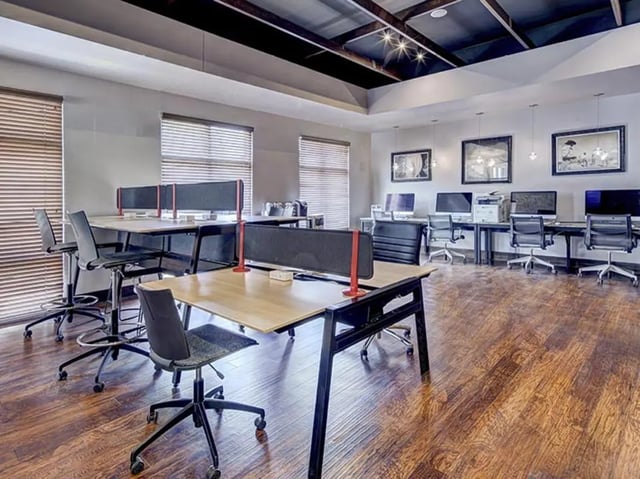 Desks computers and chairs study area at The Village at Overton Park in Lubbock Student Accommodation