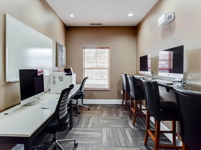 Computers printers and chairs study area at University Commons in Minneapolis Student Accommodation