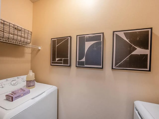 Washer artwork and shelf laundry room at University Commons in Minneapolis Student Accommodation
