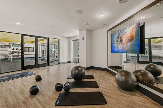 Gym equipment yoga mats and medicine balls gym at Current Orlando in Orlando Student Accommodation