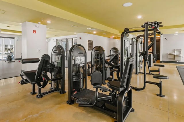 Workout machines and gym equipment gym room at Current Orlando in Orlando Student Accommodation