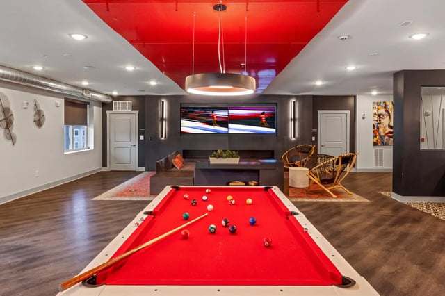 Pool table with billiard balls and cue. at Atlas Athens in Athens Student Accommodation