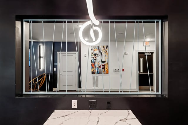 Abstract art on wall doors and stairwell interior at Atlas Athens in Athens Student Accommodation
