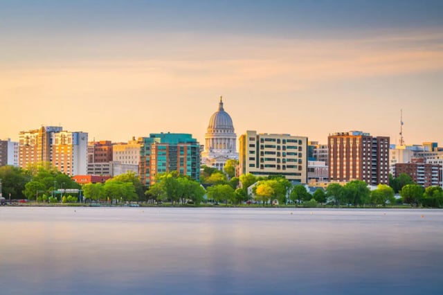 Cityscape with buildings trees and lake exterior at Atmosphere Madison in Madison Student Accommodation