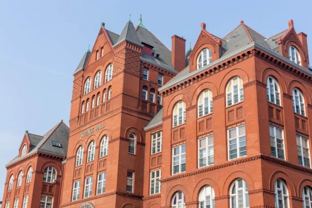 Brick building with many windows exterior at Atmosphere Madison in Madison Student Accommodation