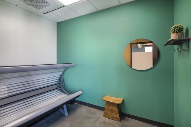 Tanning bed round mirror and stool room at Atmosphere Tempe in Tempe Student Accommodation