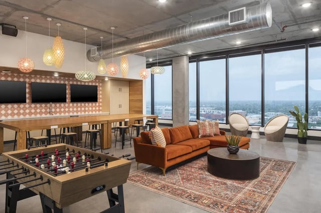 Foosball table couch and table living room at Atmosphere Tempe in Tempe Student Accommodation