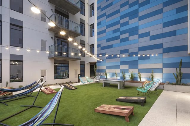 Hammocks ping pong table chairs exterior at Atmosphere Tempe in Tempe Student Accommodation