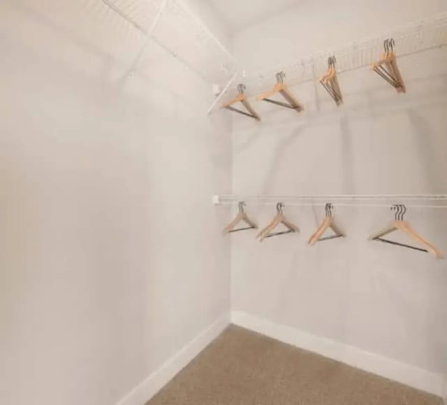 Empty closet with hangers and shelving closet at The Yards at Old State in State College Student Accommodation