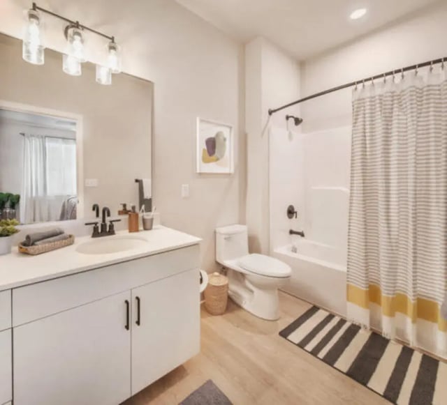 Vanity toilet bathtub shower curtain rug bathroom at The Yards at Old State in State College Student Accommodation