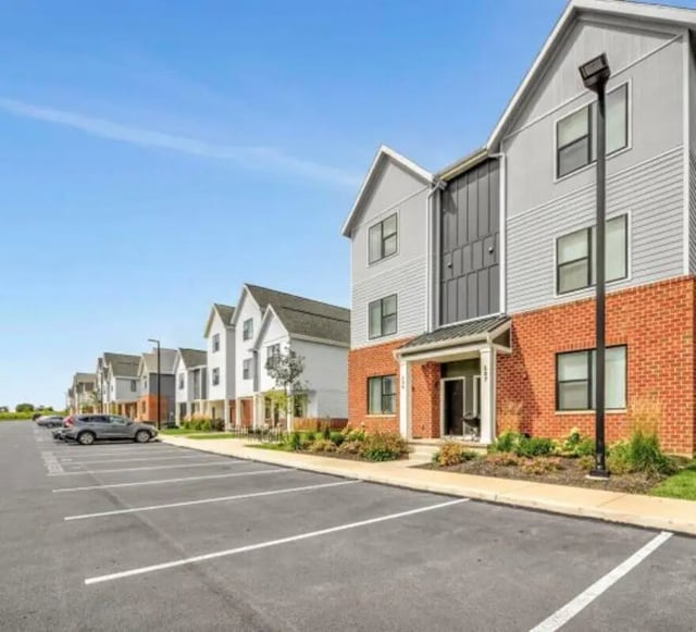 Modern townhouses with parking lot exterior at The Yards at Old State in State College Student Accommodation